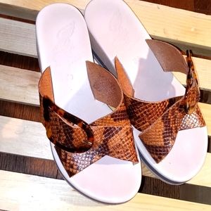 ANCIENT GREEK SANDALS ( NO RIPS OR TEARS..ALMOST. LIKE NEW)